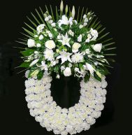 Corona de flores blanca para difuntos