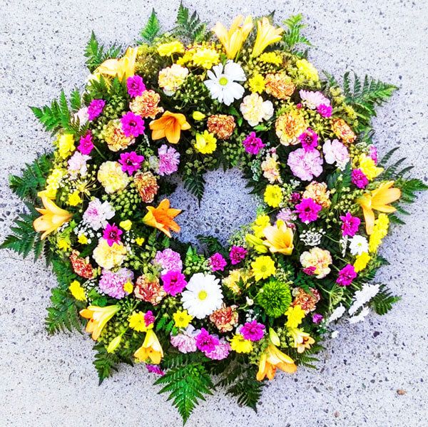 corona de flores para difuntos barata