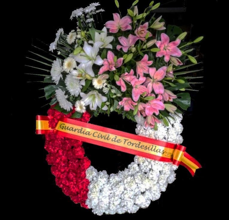 corona de flores con la bandera de España